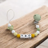 Attache-Tétine 100% Silicone : Motif Disney & Couleur Sauge 🌿