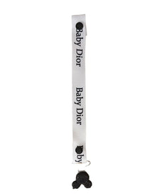 attache tétine en ruban  baby dior
