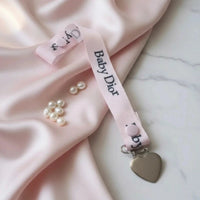 Attache tétine pour bébé baby dior rose et son clips en forme de  coeur métal