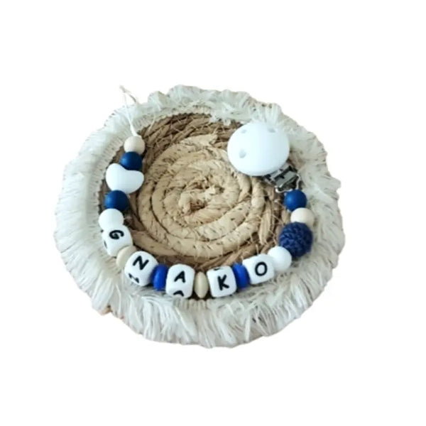 Attache tétine en silicone mam en bleu et blanc 
