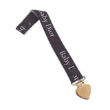 Attache tétine baby dior noir