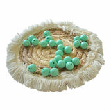 perle en silicone ronde en 12 mm de couleur menthe