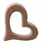 Personnalisez vos créations avec l'anneau de dentition en bois forme cœur. Idéal pour attaches tétines et hochets. Bois de hêtre naturel, sans BPA, poli.DIY