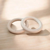 Anneau rond en bois naturel de 50 mm de diamètre avec un trou central de 3 cm pour création de jouets d'éveil.