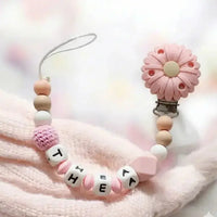 attache tetine clip marguerite rose personnalisé avec le prénom en silicone 