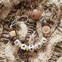 Attache tétine clip perle marron pailleté