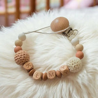 attache tétine en crochet silicone et bois