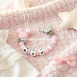 attache tétine disney rose