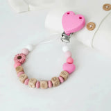 Attache tétine artisanale avec perles en silicone lilas et perles en bois naturel munie d'un clip lilas et d'un adaptateur Mam.