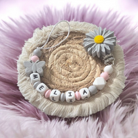 attache tetine marguerite