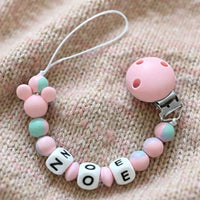 attache tétine clip minnie rose et turquoise 