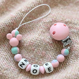 attache tétine clip minnie rose et turquoise 