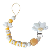 attache tétine en perle alphabet silicone blanc et or 