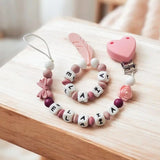 attache tétine en silicone alimentaire accompagner de son hocher personnalisé modèle fille 