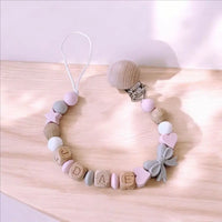 attache tétine personnalisé avec adaptateur mam motif etoile rose 