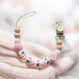 attache tétine personnalisé en silicone de couleur rose