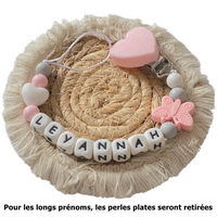 attache personnalisé de couleur rose et blanc 