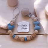 attache tétine personnalisée en silicone et bois de couleur bleu et marron