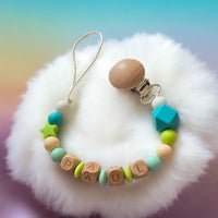 attache tétine personnalisé pour bébé de couleur turquoise 