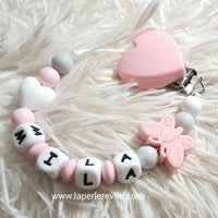 attache tétine en silicone motif coeur blanc 