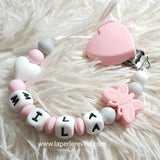 attache tétine en silicone motif coeur blanc 