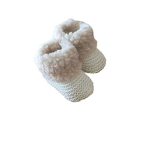 chausson bébé en laine avec fourrure de couleur blanc lait