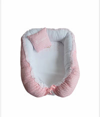 cocon pour lit bébé confort remboure réducteur de lit de couleur rose 
