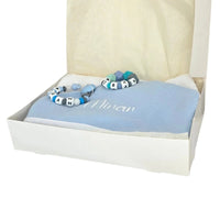 présentation d'un coffret cadeau garçon bleu clair