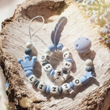 ensemble d'attache tétine et anneau de dentition pour bébé