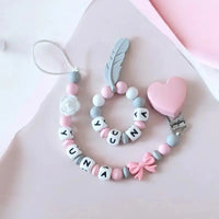 modèle pour fille attache tétine et anneau de dentition assortis