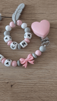 attache tétine et anneau de dentition assortis modèle fille 