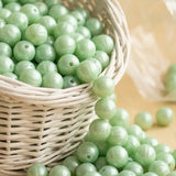 Perle ronde silicone 12mm vert clair nacré