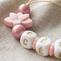 modèle attache tétine floral rose la perle revée