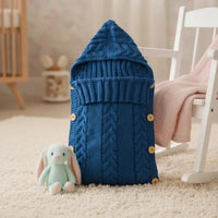 nid d'ange cosy tricot de couleur bleu motif torsadé