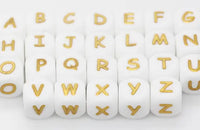 perle lettre alphabet en silicone ecriture or pour confection attache tétine fournisseur