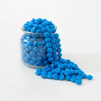 Perle de séparation lentille 12 mm bleue en silicone sans BPA. Idéale pour créer vos attaches tétines, hochets et bijoux de dentition sécurisés. Qualité professionnelle et chic.