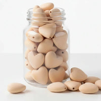 Perle artisanale en bois de hêtre naturel en forme de cœur de 20 mm pour la confection d'accessoires DIY.