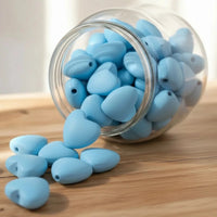 Perle en bois en forme de cœur couleur bleue 20 mm pour la fabrication d'accessoires de puériculture et DIY.