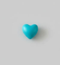 perle en coeur de couleur turquoise en silicone
