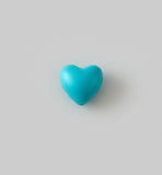 perle en coeur de couleur turquoise en silicone