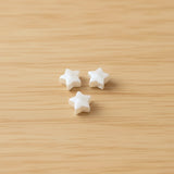 perle étoile en silicone blanche de 12 mm