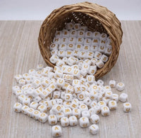 perle lettre alphabet en silicone blanc et or pour confection attache tetine anneau dentition fournisseur attache tétine 