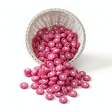 cette perle marguerite de couleur framboise de 20 mm parfait pour les création d'attache tetine 