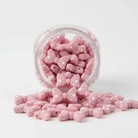 perle en silicone forme minnie de couleur vieux rose pour activité diy