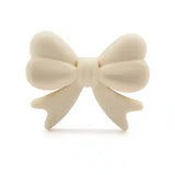 perle noeud en silicone beige pour confection attache tetine et anneau dentition