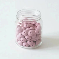 découvrez notre perle plate en silicone rose blush pour  vos création diy
