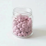 découvrez notre perle plate en silicone rose blush pour  vos création diy
