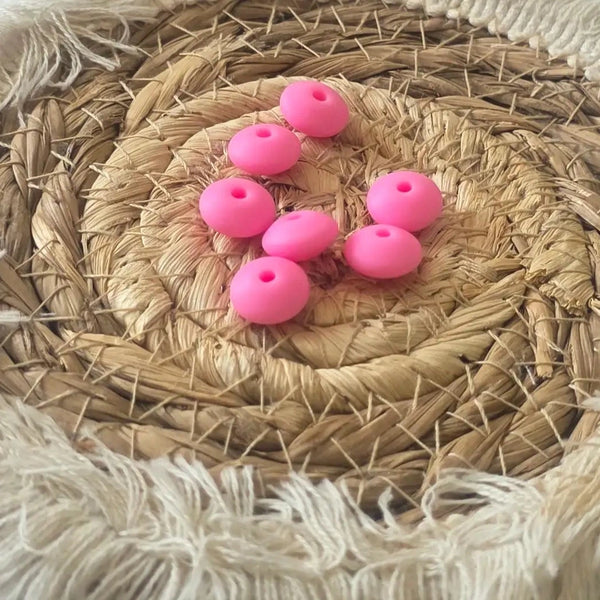 perle en silicone plate 12 mm couleur rose