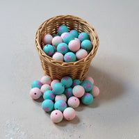 Perle ronde en silicone de 15 mm avec un motif étoile en relief pour la fabrication de jouets de dentition et accessoires bébé.
