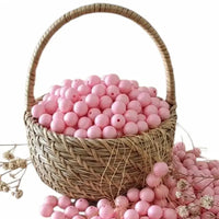 perle ronde rose bonbon 12 mm pour confection attache tétine et anneau de dentition